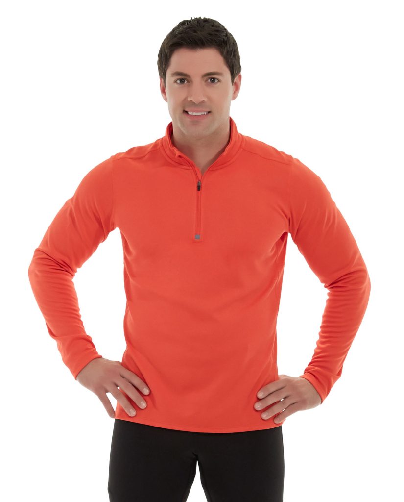 Male hiker wearing gray Mars HeatTech pullover jacket in snowy mountain landscape