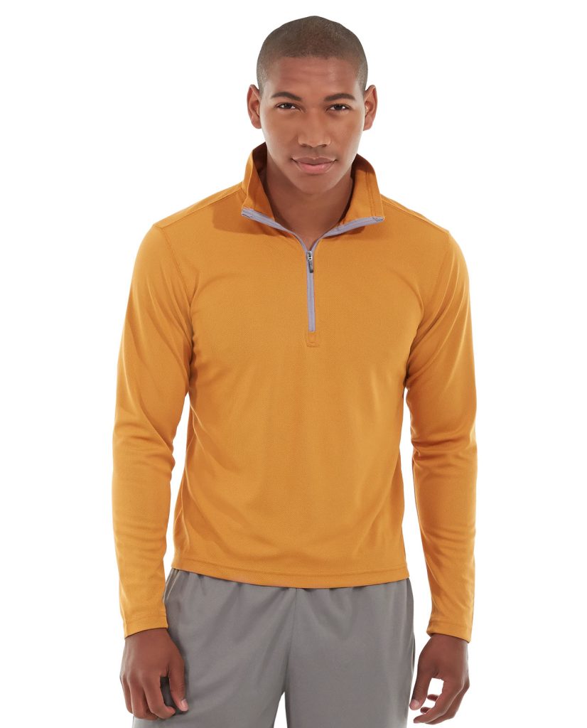 Athletic model wearing a versatile black and gray hybrid jacket-shirt outdoors
