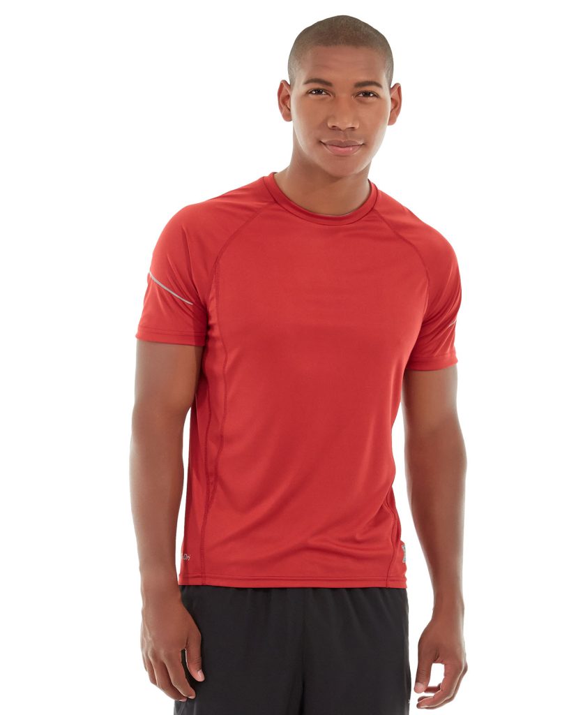 Male runner wearing a gray crew-neck athletic shirt, mid-stride on a trail